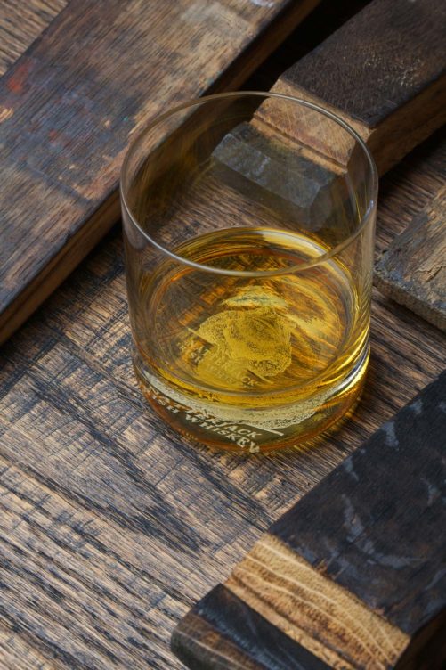 Natterjack Irish Whiskey Glass on Wooden Table