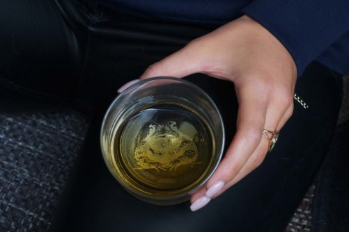 Natterjack Irish Whiskey Glass in Female Hand