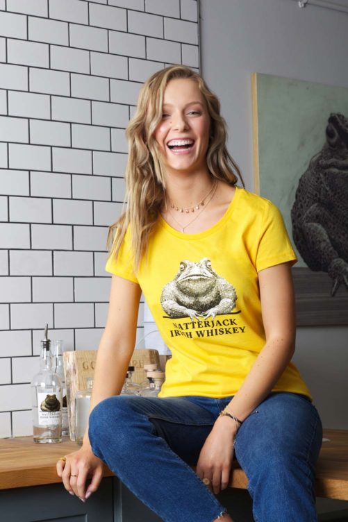 Woman-Laughing-Wearing-Yellow-Natterjack-Whiskey-Tshirt